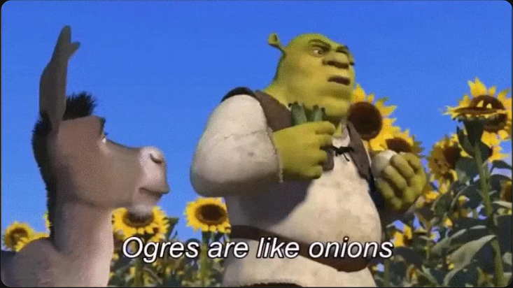 Shrek holding an onion beside Donkey in a sunflower field, subtitled "Ogres are like onions"